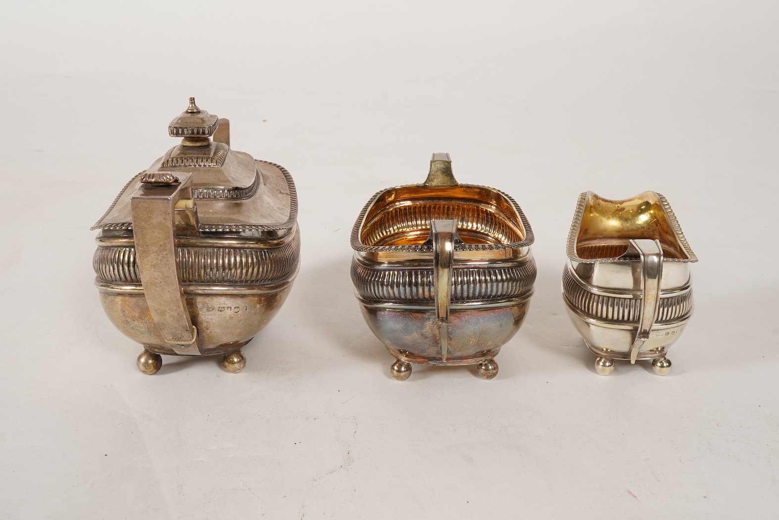 A George III silver three piece tea set, by John Wakefield